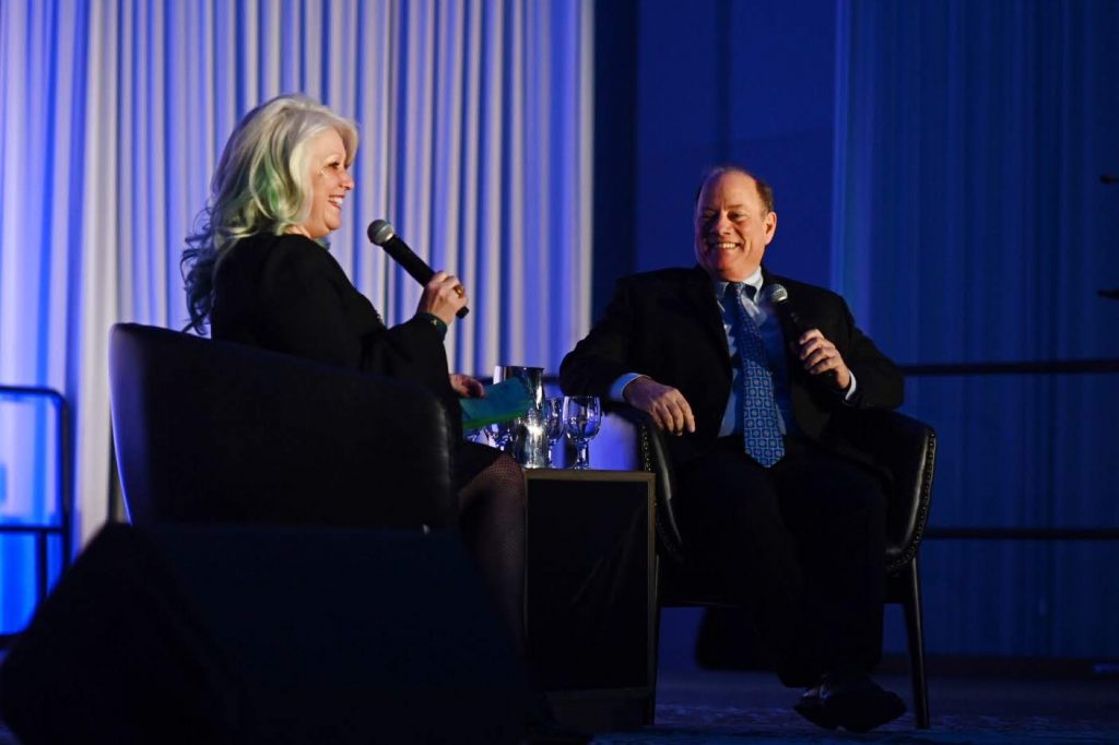 CHAIR OF THE DDP CINDY PASKY AND DETROIT MAYOR MIKE DUGGAN TALK AT TCF. PHOTO BY THE DOWNTOWN DETROIT PARTNERSHIP