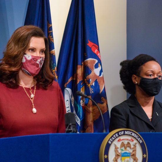 Whitmer Speaking in a mask // 2022 Michigan budget photo // GOV. WHITMER DURING A COVID-19 UPDATE. PHOTO OFFICE OF THE GOVERNOR