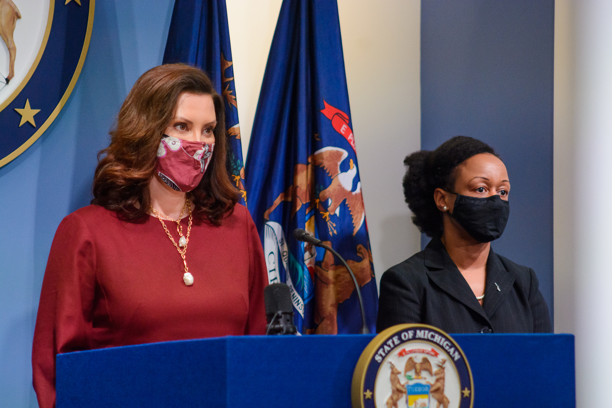 Whitmer Speaking in a mask // 2022 Michigan budget photo // GOV. WHITMER DURING A COVID-19 UPDATE. PHOTO OFFICE OF THE GOVERNOR