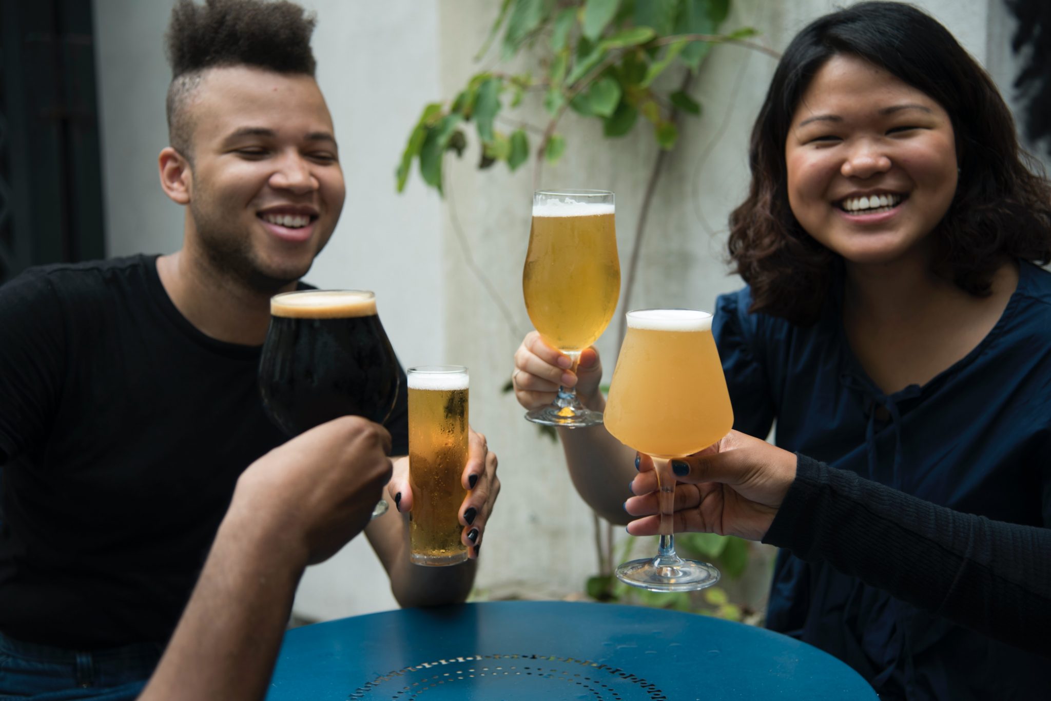 People gather with drinks for St. Patrick's day // PHOTO BY KELLY SIKKEMA / UNSPLASH