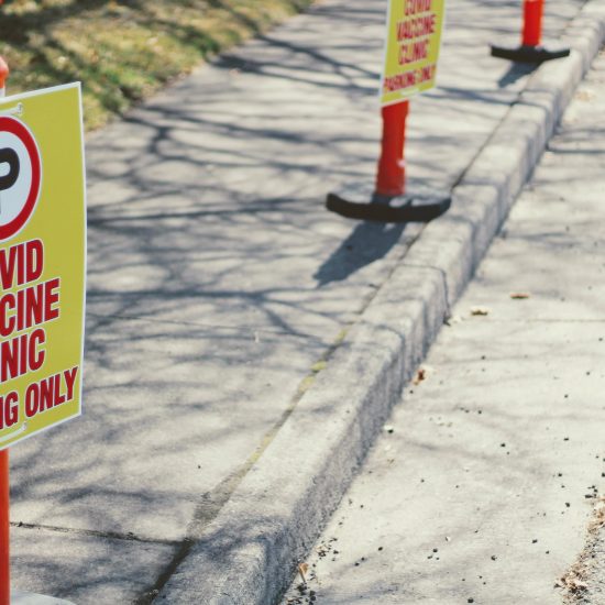 vaccine shot / cones with signs / PHOTO BY JOSHUA HOEHNE ON UNSPLASH
