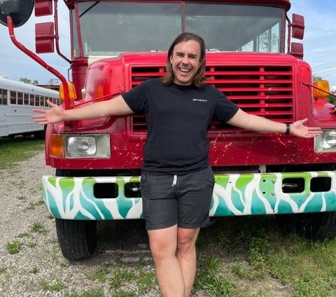 ANDY DIDOROSI IN FRONT OF HIS DREAM BUS. PHOTO MAUREEN MCDONALD