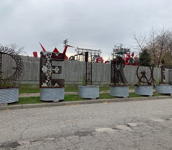 AT THE ENTRANCE OF THE SKY GARDEN SITS AN HOMAGE TO SUSTAINABILITY IN DETROIT - ALL CREATED FROM UPCYCLED MATERIALS