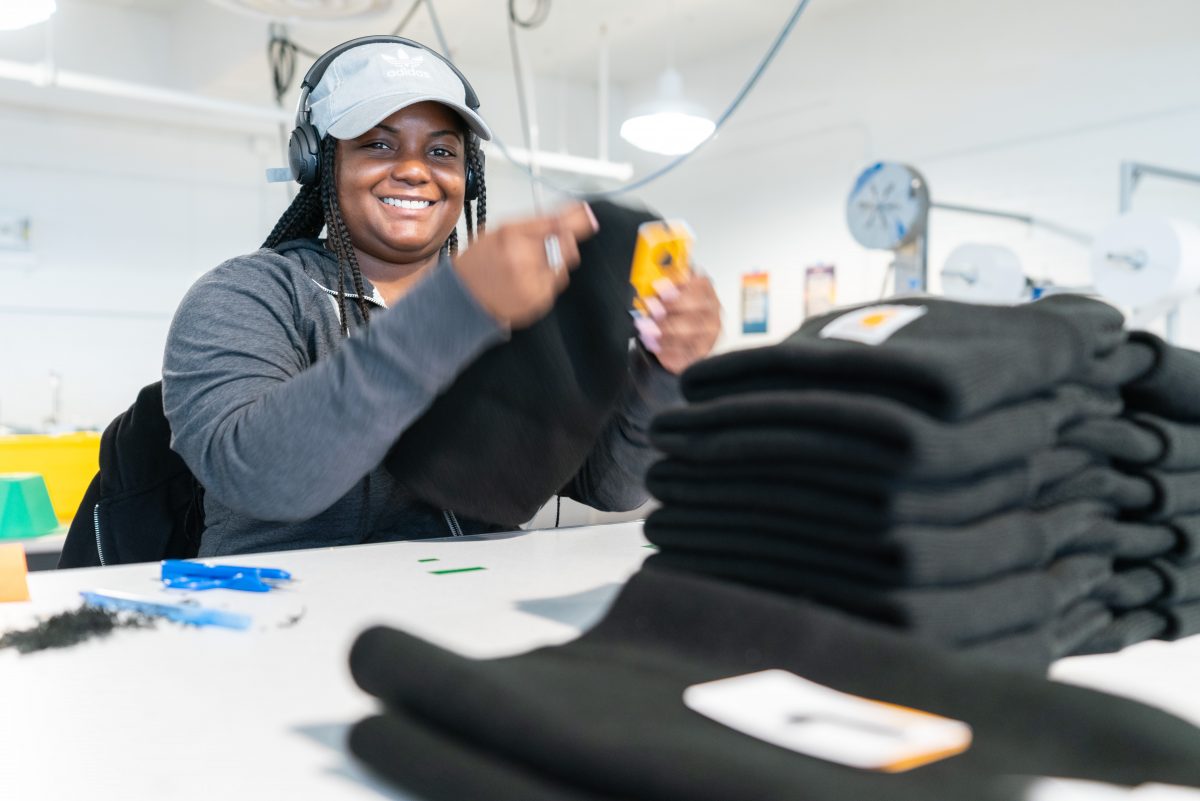 CARHARTT BEANIES BEING MANUFACTURED AT THE ISIAC FACTORY