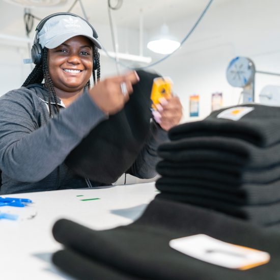 CARHARTT BEANIES BEING MANUFACTURED AT THE ISIAC FACTORY