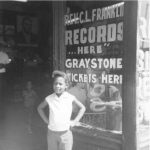MARSHA MUSIC AT 6 YEARS OLD, IN THE DOORWAY OF THE HASTINGS ST. STORE, IN 1960. MARSHA MUSIC/FAMILY COLLECTION