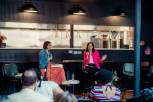SENATOR CHANGE AND KATY TRUDEAU CEO OF EASTERN MARKET SPEAKING AT BUSINESS OF FOOD SUMMIT 2026