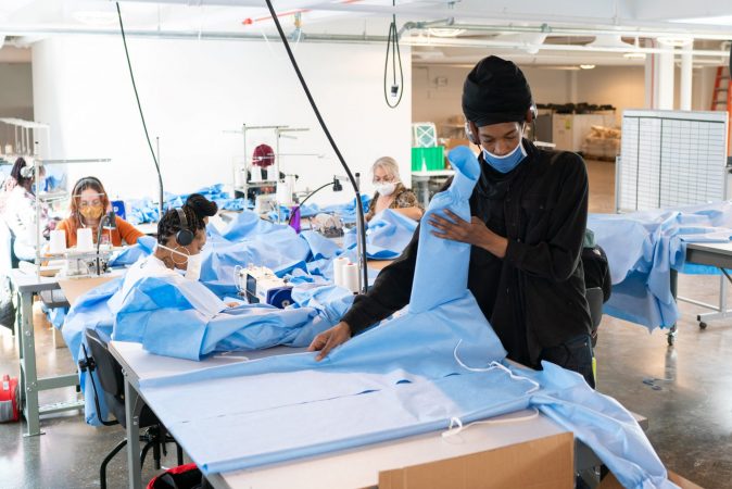 ISAIC CREATING GOWNS FOR MEDICAL STAFF