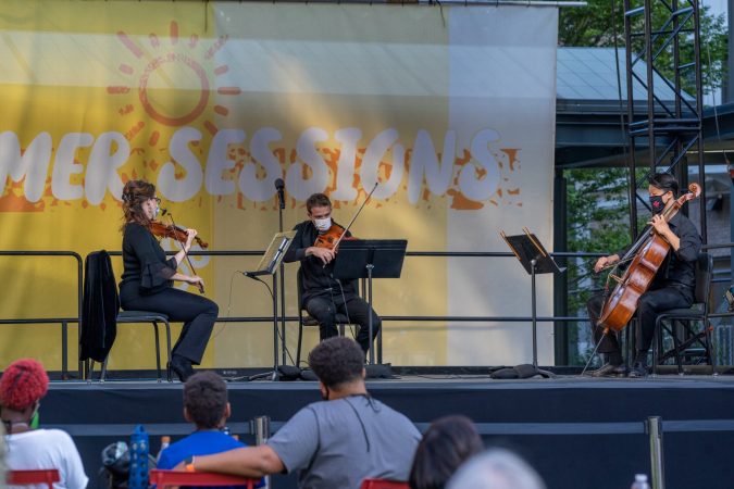 DSO ACTING CONCERTMASTER KIMBERLY KALOYANIDES KENNEDY, PRINCIPAL VIOLA ERIC NOWLIN, AND PRINCIPAL CELLO WEI YU PERFORM IN SOSNICK COURTYARD ON AUGUST 5, 2020