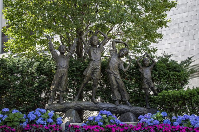 THE STATUE OUTSIDE OF THE DOWNTOWN DETROIT BRANCH OF THE YMCA OF METROPOLITAN DETROIT. PHOTO JOHN BOZICK