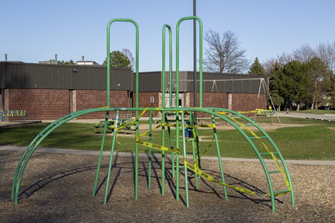 TEACHING AMID PANDEMIC: THE PLAYGROUND OF A METRO DETROIT SCHOOL REMAINS CLOSED AMID THE COVID-19 CRISIS. PHOTO JOHN BOZICK