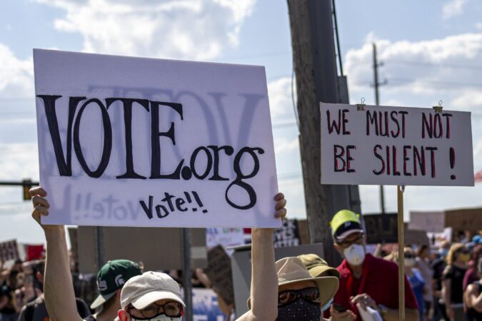 Voting in Detroit GET OUT THE VOTE ON AUGUST 4. PHOTO JOHN BOZICK